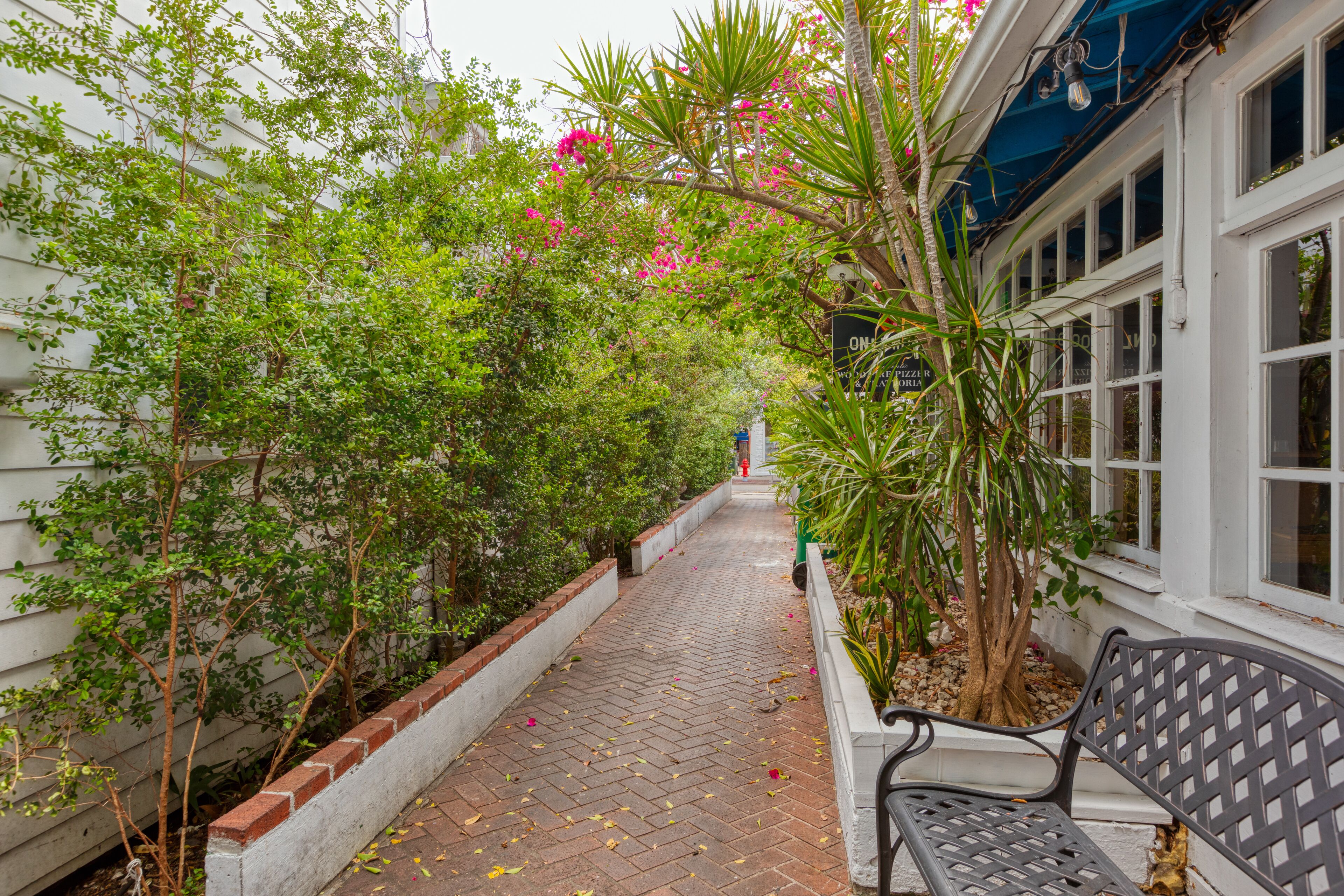 JUST OFF DUVAL~ 2nd Floor Condo in Center of Duval St. with Parking Space!