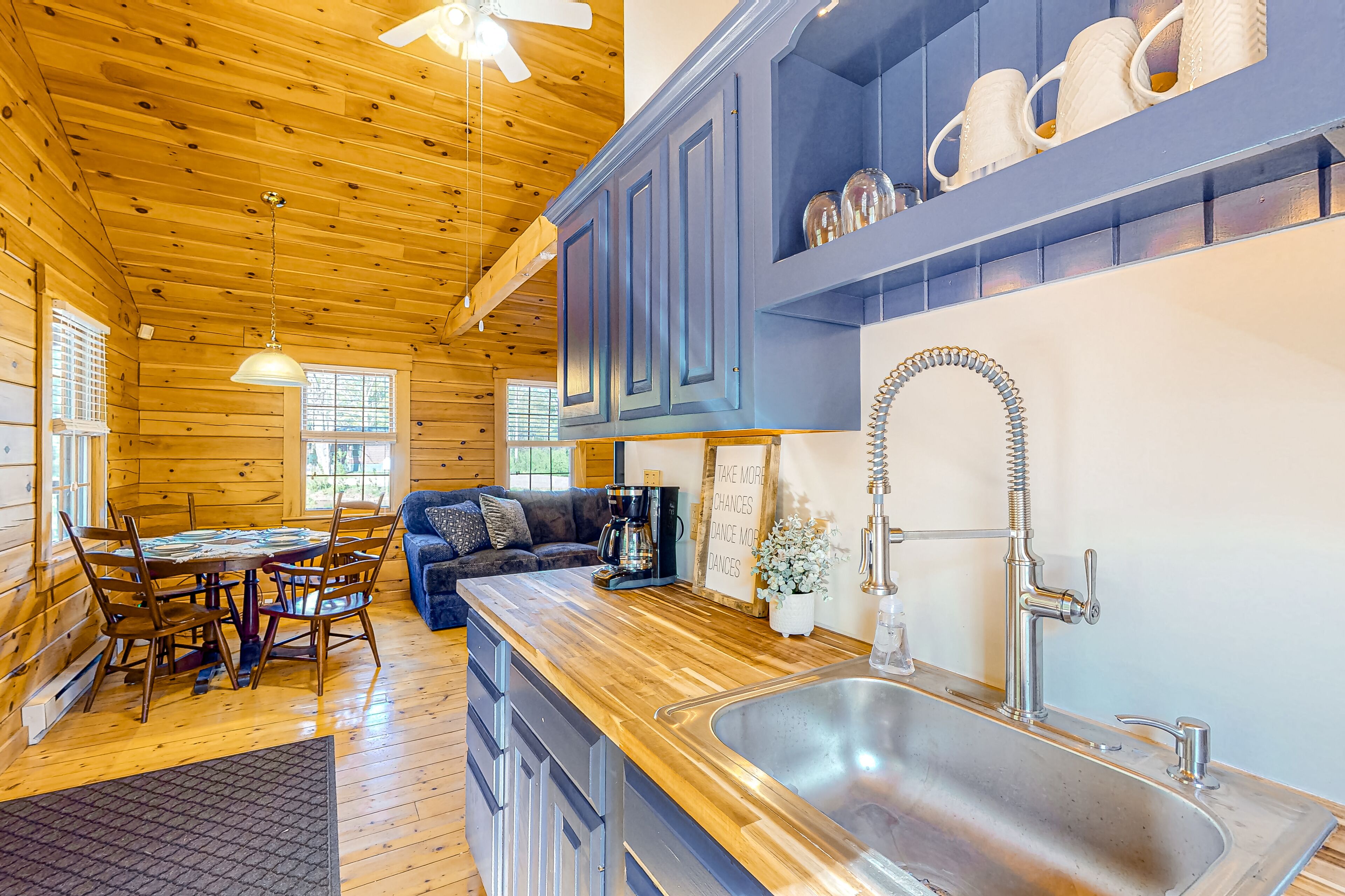 Two log cabins on 5 acres with patios, grill, firepit, outdoor games, & W/D